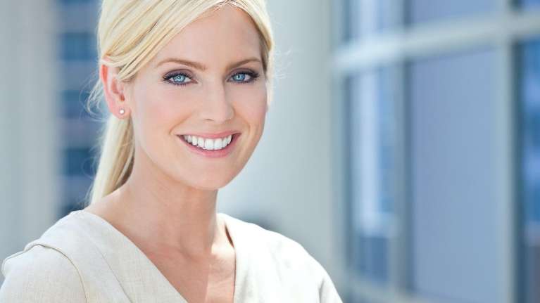 woman with blonde hair and blue eyes