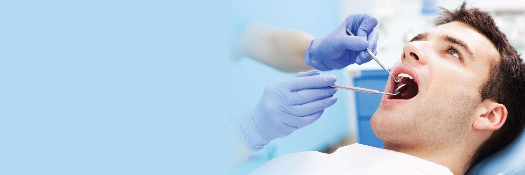 A Man Getting Treated for Dental Implants in Watkinsville, GA