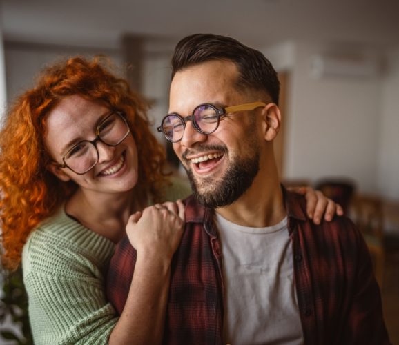 Portrait,Of,Adult,Hugged,Couple,Smile,At,Home,Happy,Together